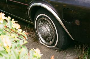 Photo of flat tyre on a car